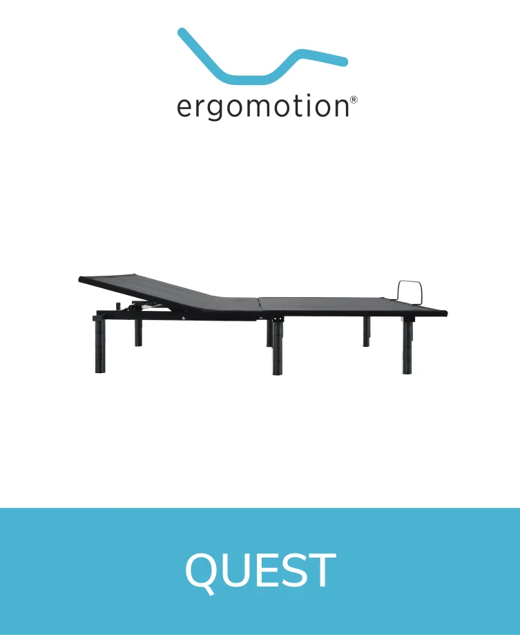 Ergomotion Quest adjustable bed with a light-colored wooden headboard and a black base