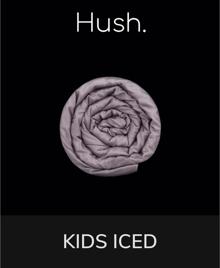 Hush Kids Iced cooling weighted blanket in a playful pattern, neatly folded on a bed